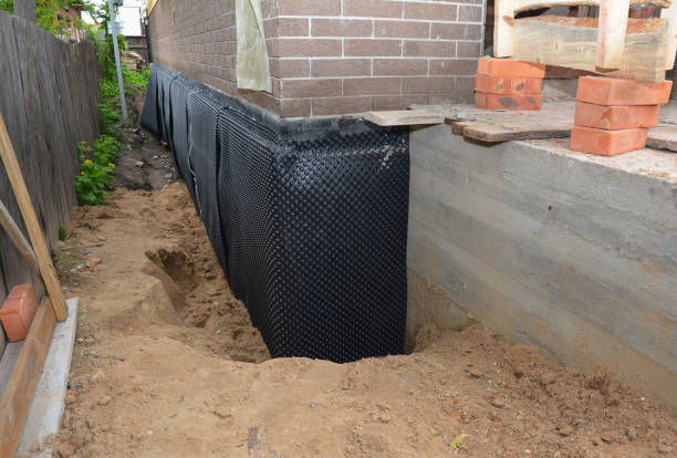 SJ Waterproofing Pros technician performing targeted Emergency Waterproofing assessment in Mount Juliet, TN